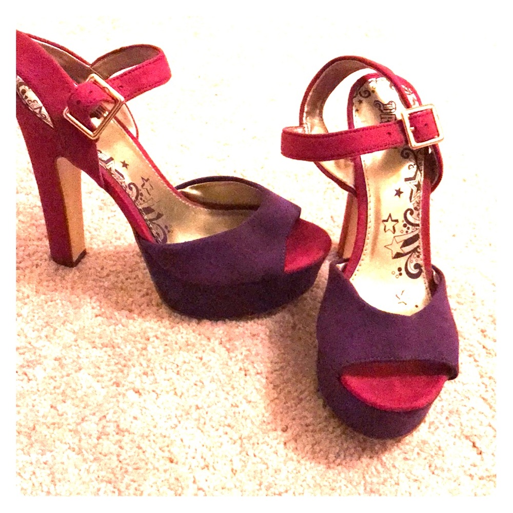 Worn twice pink and purple pumps